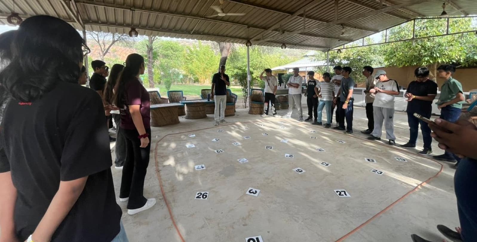 Working a numbered-grid challenge as a team.