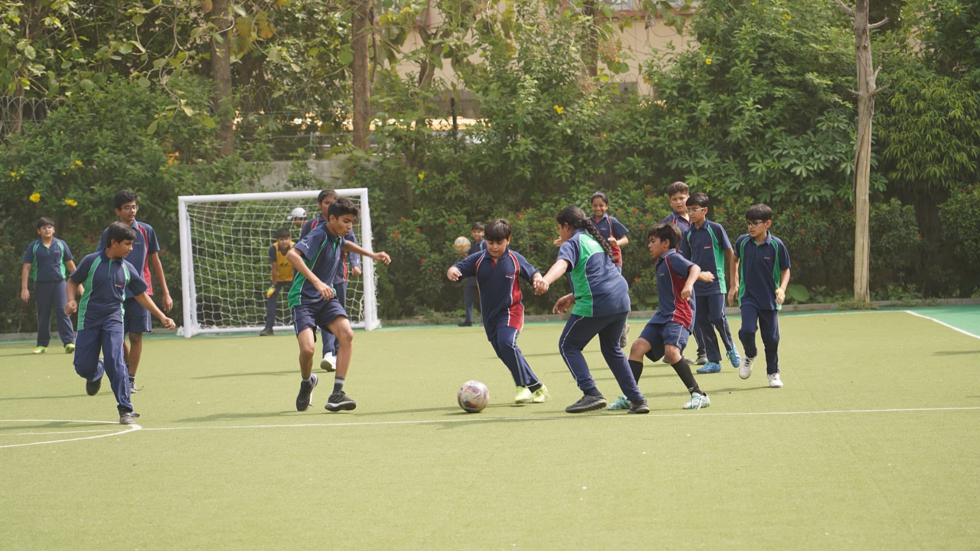 A full-sided game — space, movement and teamwork.
