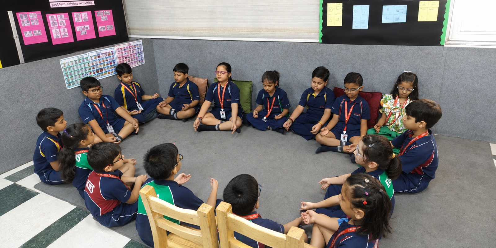 Students sitting in a circle for a mindfulness session at Khaitan World School